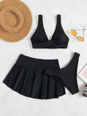 bikini unicolore torsadé avec jupe de plage